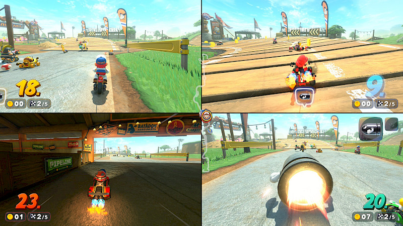 Auf dem Screenshot aus Mario Kart World sind vier Spielperspektiven vorhanden, die sich auf einer Rennstecke befinden. Der Spieler rechts unten benutzt eine Rakete. Bei dem Spieler rechts oben wird diese Rakete als Warnsymbol angezeigt.